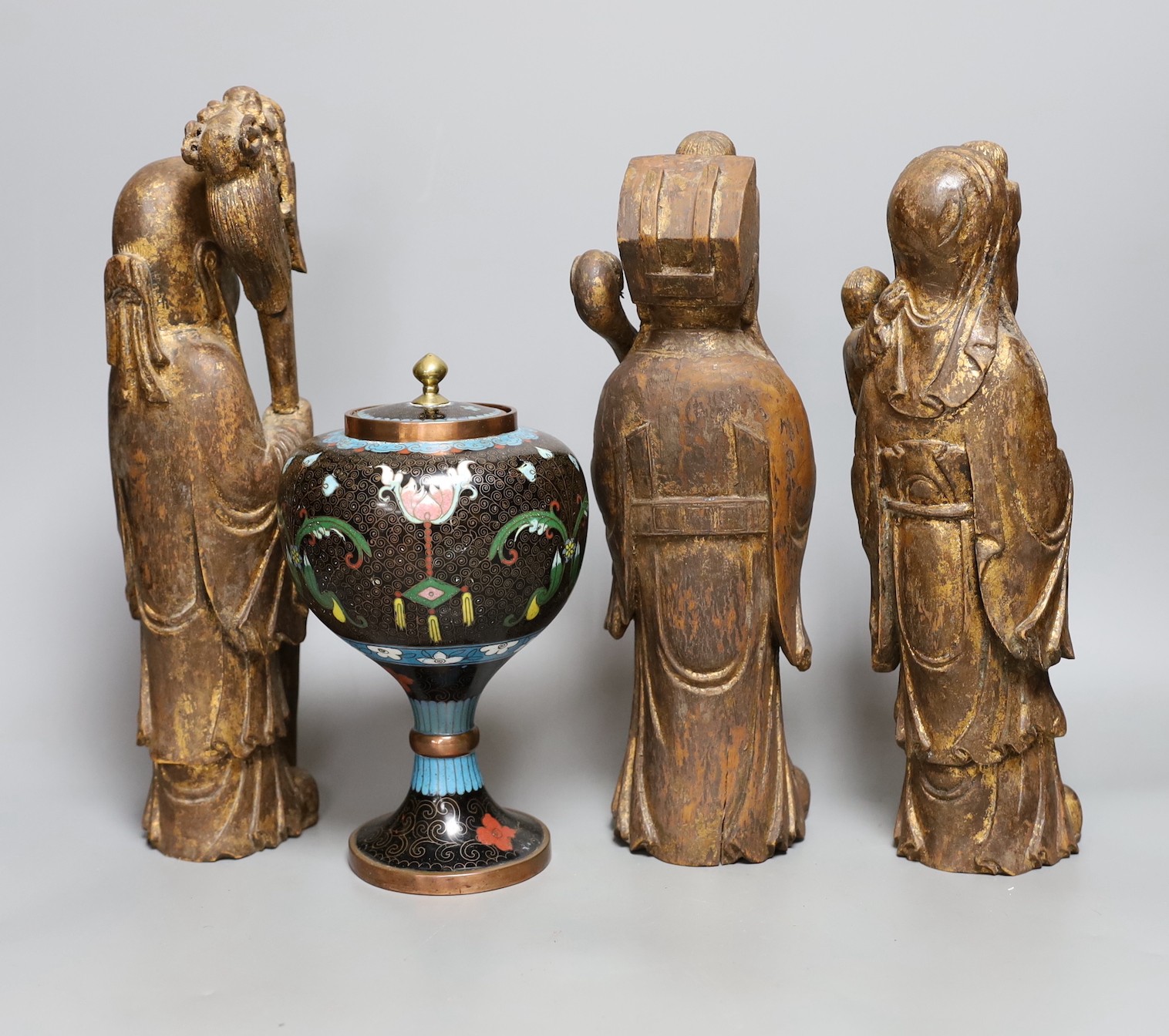 A group of three Chinese giltwood figures of the Star Gods and a Chinese cloisonné enamel jar, 33cm